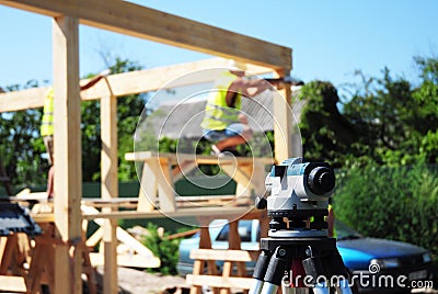 A close-up on theodolite, tacheometer, builder`s level, optical instrument used for angular measurement and building surveys on Stock Photo