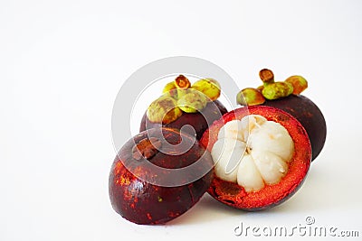 Close-up of three mangosteens in the white background Stock Photo