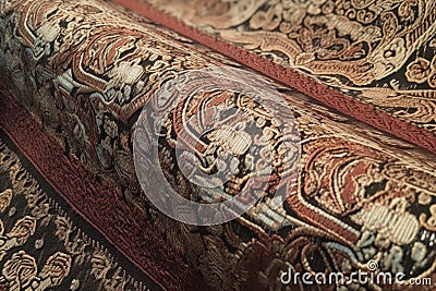 close-up of tightly woven fabric, with intricate patterns visible Stock Photo