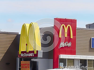 A close up to a McDonalds fast food restaurant sign Editorial Stock Photo