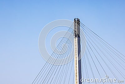 Close up top of suspension tower and cables of Bob Kerrey Pedestrian bridge in downtown Omaha Stock Photo