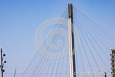 Close up top of suspension tower and cables of Bob Kerrey Pedestrian bridge in downtown Omaha Stock Photo