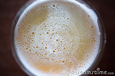 Close up top view bubble froth of beer on glasses Stock Photo