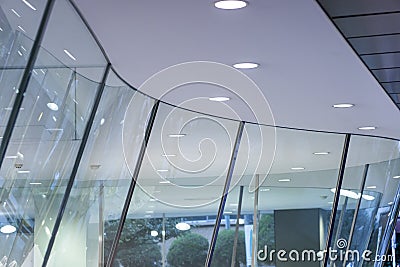 Close-Up the Top View of Double Curve Glass Panel of the Showcase. Curved of Shop Windows Editorial Stock Photo