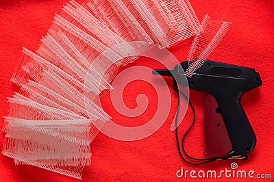 Close up, top view. Tag Gun, Clothing Tagging Tool Stock Photo