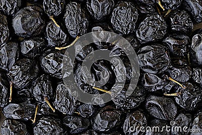 Close-up topview photo of dried dark grapes as a background Stock Photo