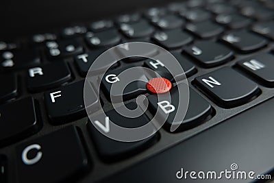 Trackpoint pointing device on Lenovo Thinkpad notebook computer Editorial Stock Photo