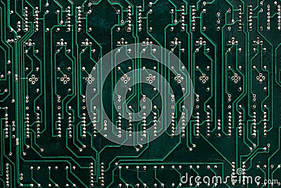 Close up - the tracks on the green motherboard Stock Photo