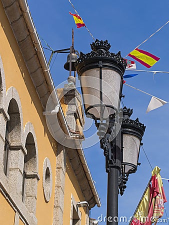 Close-up of traditional cast iron street lamps. Village in Spain. Stock Photo