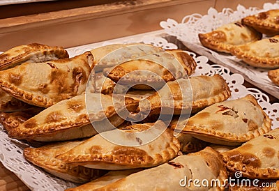 Close up of traditional fried Spanish and Argentine empanadas at a street food market in spain Stock Photo