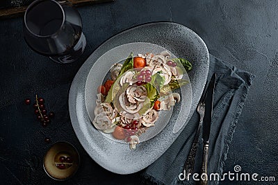Close up on traditional italian cuisine Vitello tonnato. A dish with pickled veal with tuna cream sauce and bread on Stock Photo