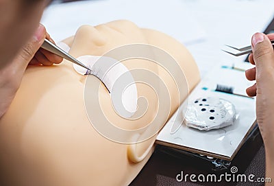 Close up training for permanent eyelash extension on Silicone Ma Stock Photo