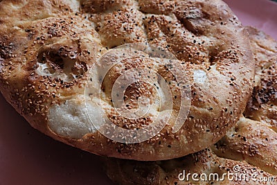 Close up of Turkish Ramadan Pita. bread. Traditional Ramadan food as known Ramazan Pidesi Pide. Stock Photo
