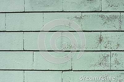 Close-up, turquoise wall with a block of bricks Stock Photo