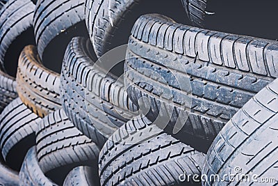 Close up tyres stacked outside for recycling Stock Photo