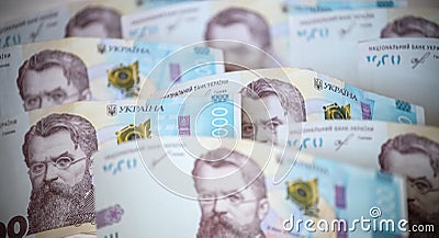 Close up 1000 Ukrainian money hryvnia on white background. Business flat lay with copy space for text. Crisis and problem of Stock Photo