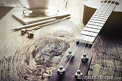 Close up of ukulele on old wood background with soft light Stock Photo