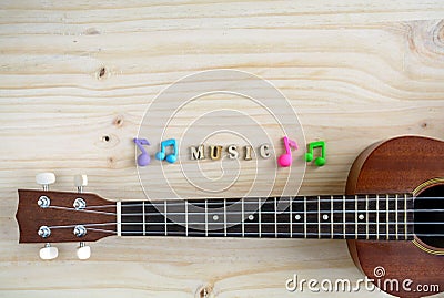 Close up of ukulele on old wooden background Stock Photo