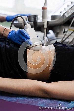 Close-up ultrasound of abdominal organs of girl for diagnosis of liver, pancreas, gallbladder. Abdominal ultrasound for Stock Photo