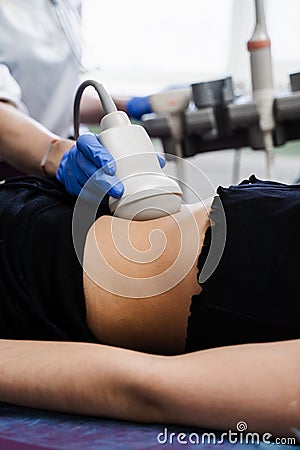 Close-up ultrasound of abdominal organs of girl for diagnosis of liver, pancreas, gallbladder. Abdominal ultrasound for Stock Photo