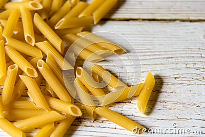 Close up of uncooked penne pasta Stock Photo