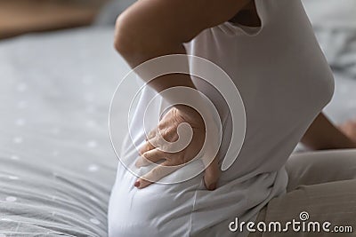 Mature senior grandmother suffering from arthritis radiculitis. Stock Photo