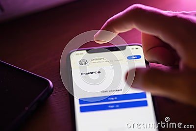 Close-up of using ChatGPT application on smartphone Editorial Stock Photo