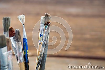 Close-up of various dirty paintbrush Stock Photo