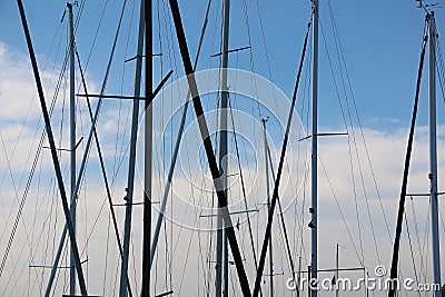 A close up of various masts of sailing ships Stock Photo