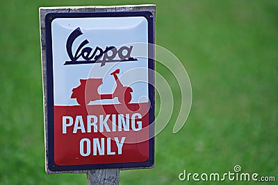 Vespa motorcycle Parking Only Sign Editorial Stock Photo