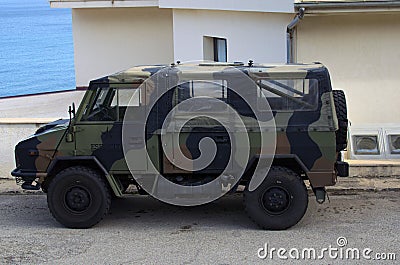 Close-up view of anti-terrorism solders patrol vehicle for the tourist sites protection. All terrain light vehicle Iveco VM90 Editorial Stock Photo