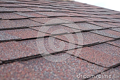 Close up view on asphalt roofing shingles Stock Photo