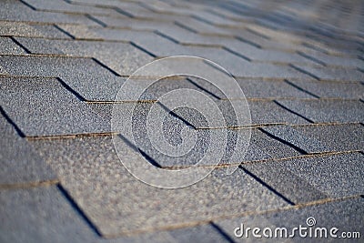 Close up view on Asphalt Roofing Shingles Background. Roof Shingles - Roofing Stock Photo
