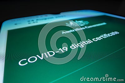 Close-up view of Australian COVID 19 digital certificate on a smartphone Editorial Stock Photo