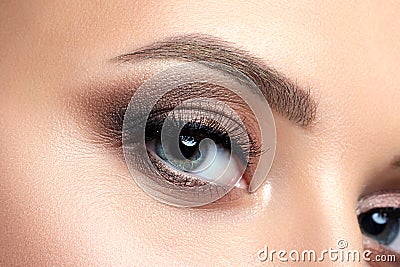 Close up view of blue woman eye with beautiful makeup Stock Photo