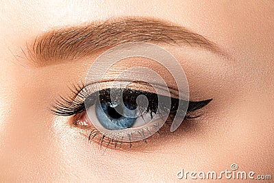 Close up view of blue woman eye with beautiful makeup Stock Photo