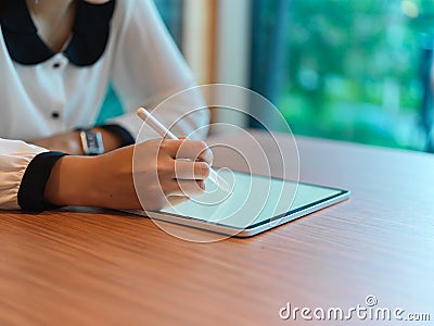 Close up view of businesswoman using mock up digital tablet Stock Photo