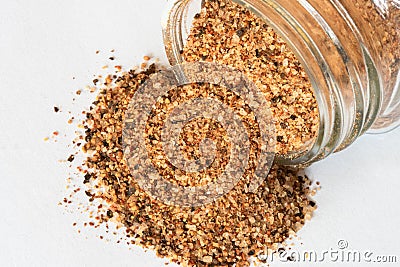 Cajun Seasoning Spilled from a Spice Jar Stock Photo