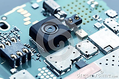 Close up view of camera inside smart phone and motherboard Stock Photo