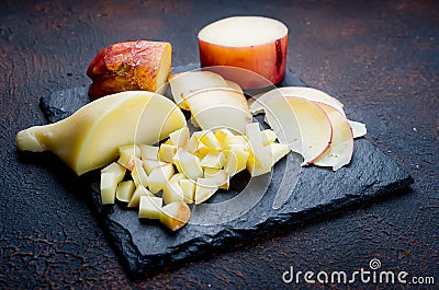 Close up view of cheese on cutting board Stock Photo
