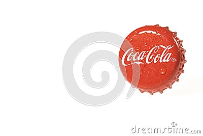 Close up view of Coca Cola metal cap isolated on white background. Editorial Stock Photo