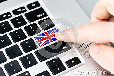 Close-up view on conceptual keyboard - Learn English & x28;key with national flag& x29; Stock Photo