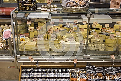 Close up view of display with different sorts of cheese. Food and health concept. Editorial Stock Photo