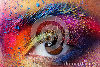 Close up view of female eye with bright multicolored fashion makeup Stock Photo