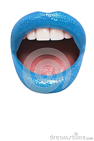 Close-up view of female wearing blue lipstick with mouth open over white background Stock Photo