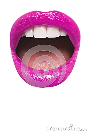 Close-up view of female wearing pink lipstick with mouth open over white background Stock Photo