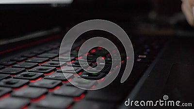 Close-up view fingers tapping keypad of laptop and writing message Stock Photo