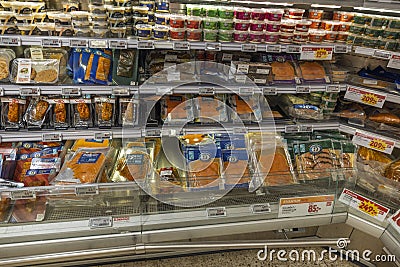 Close up view of fish food shelves of supermarket. Health and food concept. Editorial Stock Photo
