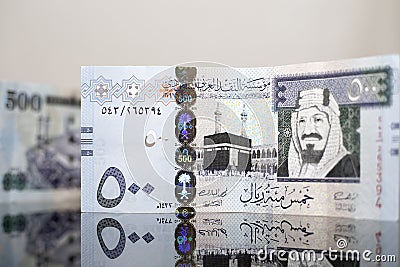 Close-up view of five hundred Saudi Riyal on a dark glass Stock Photo
