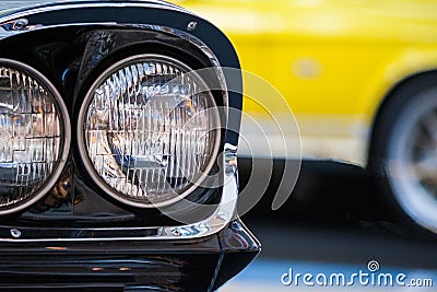 Close up view of a fragment a round headlights of retro car Stock Photo